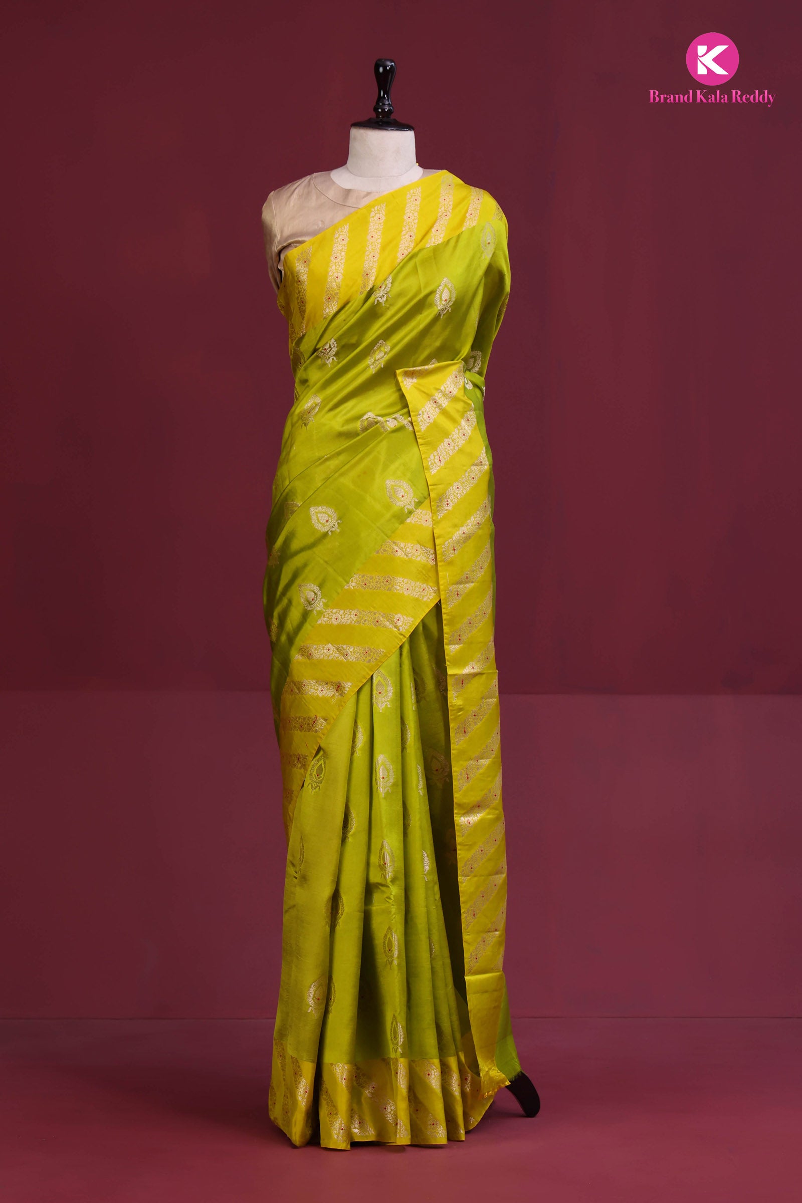 A lime green Banarasi saree