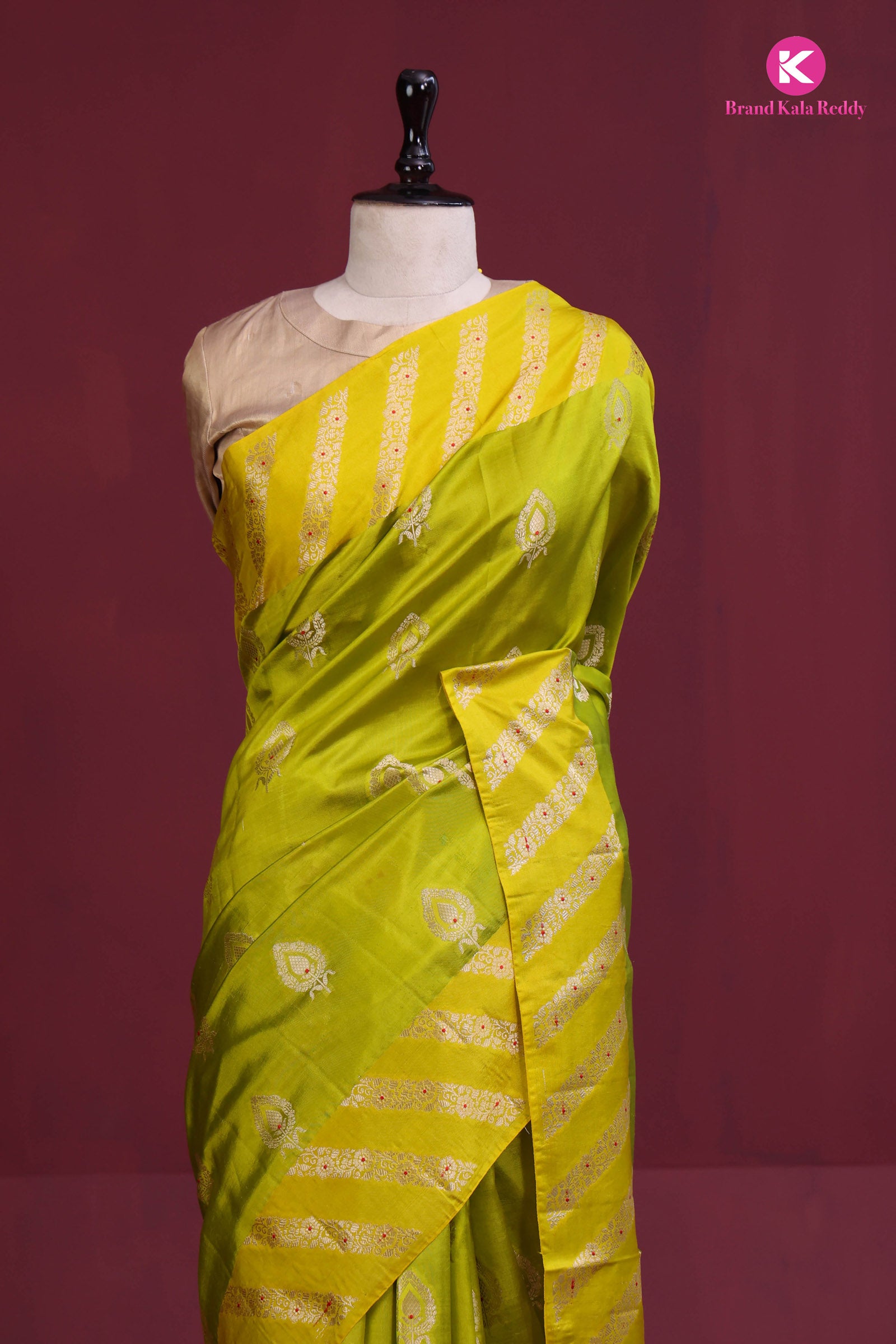A lime green Banarasi saree