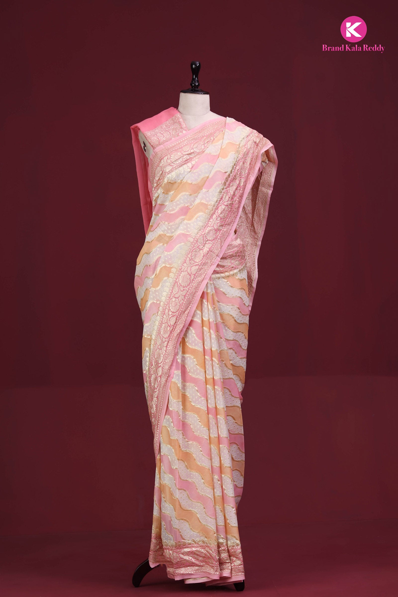 A pastel pink colour Georgette Banarasi saree in Rankat style