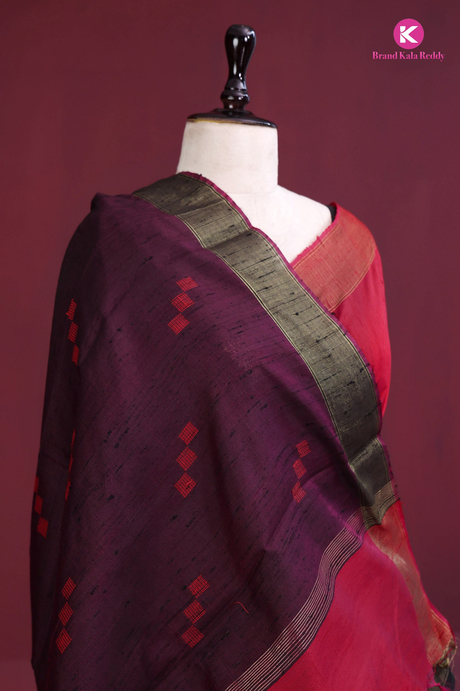 Maroon Tussar Silk Saree With a Black Border