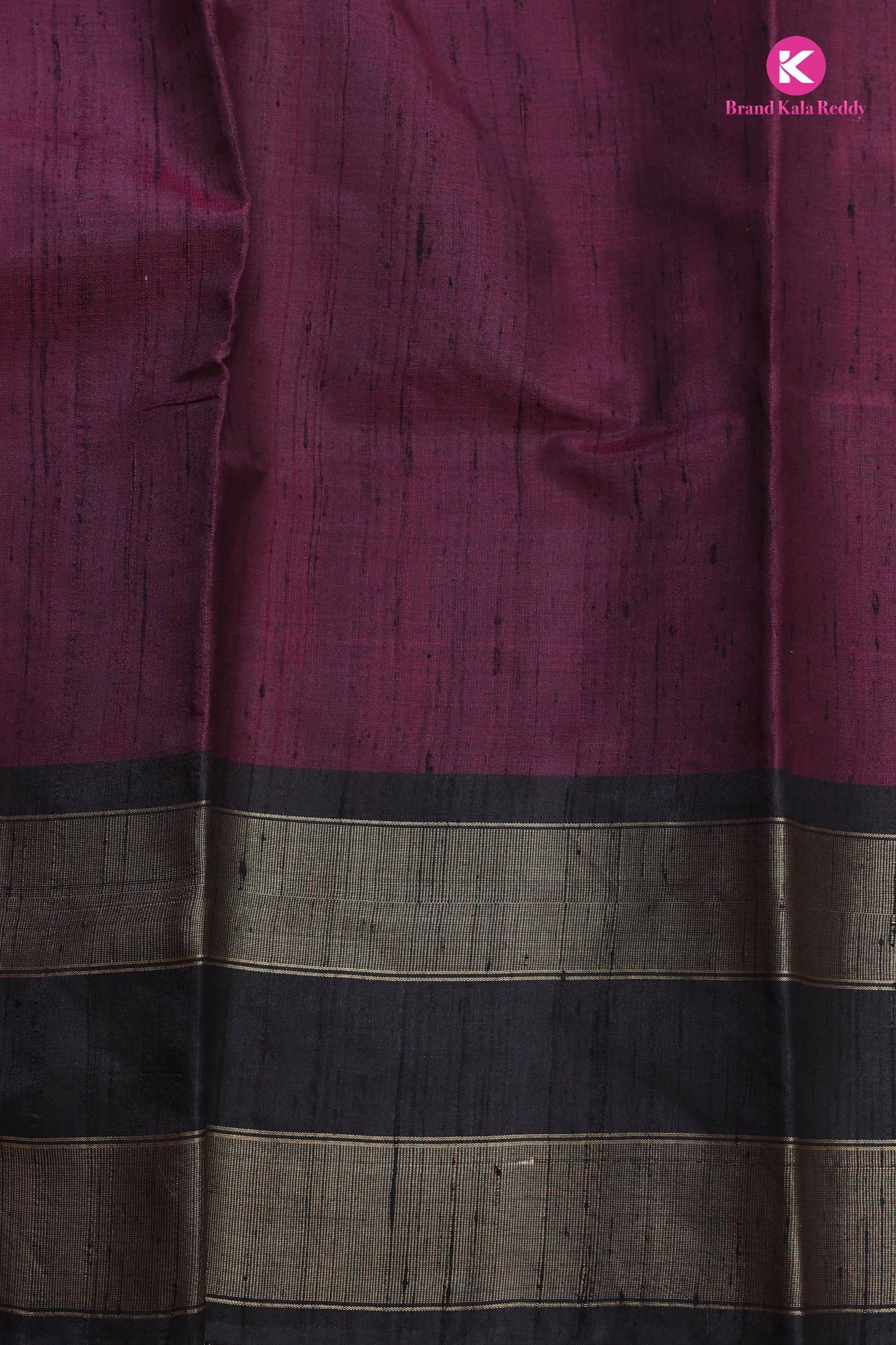 Maroon Tussar Silk Saree With a Black Border