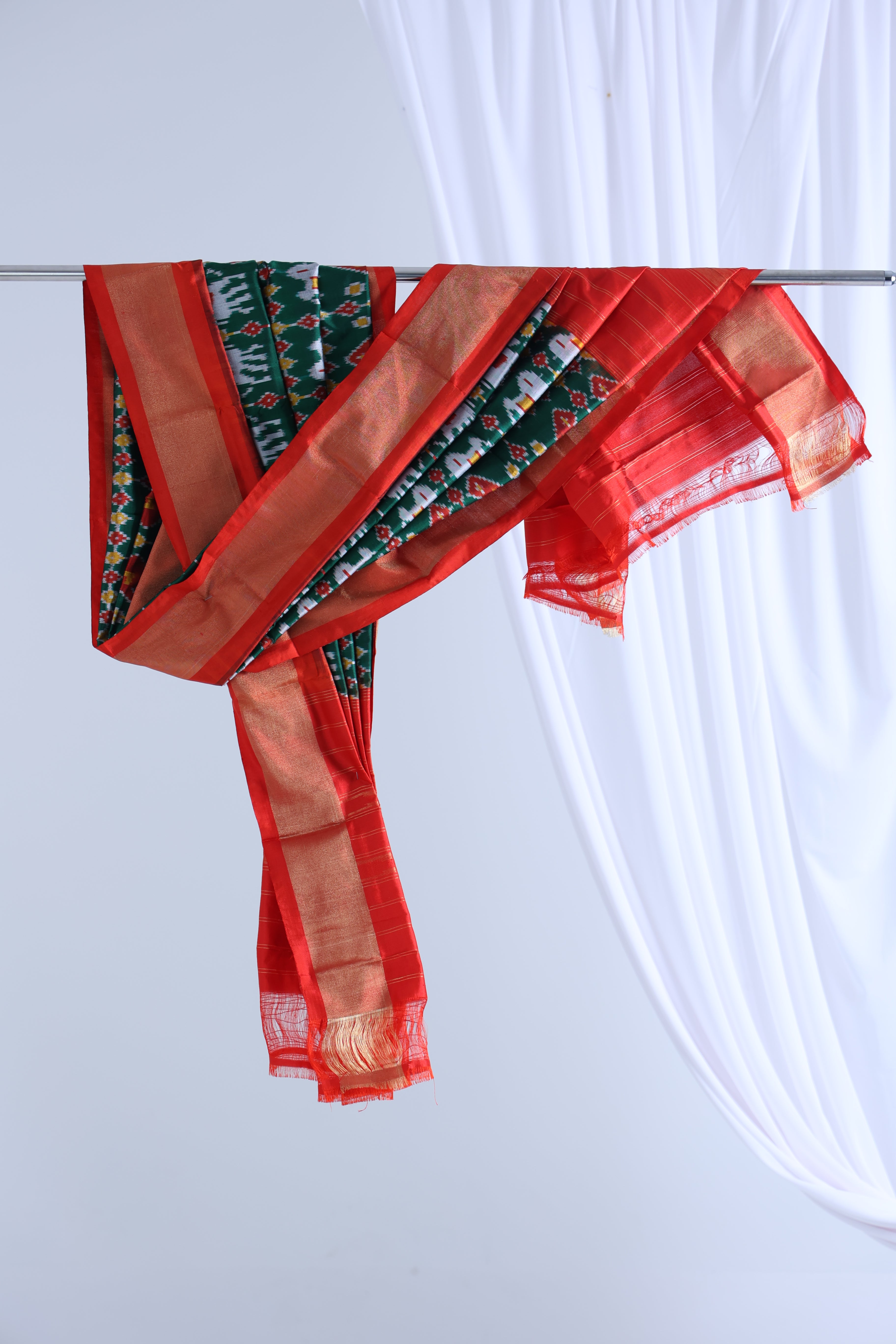 Bottle green with red colour ikkat dupatta