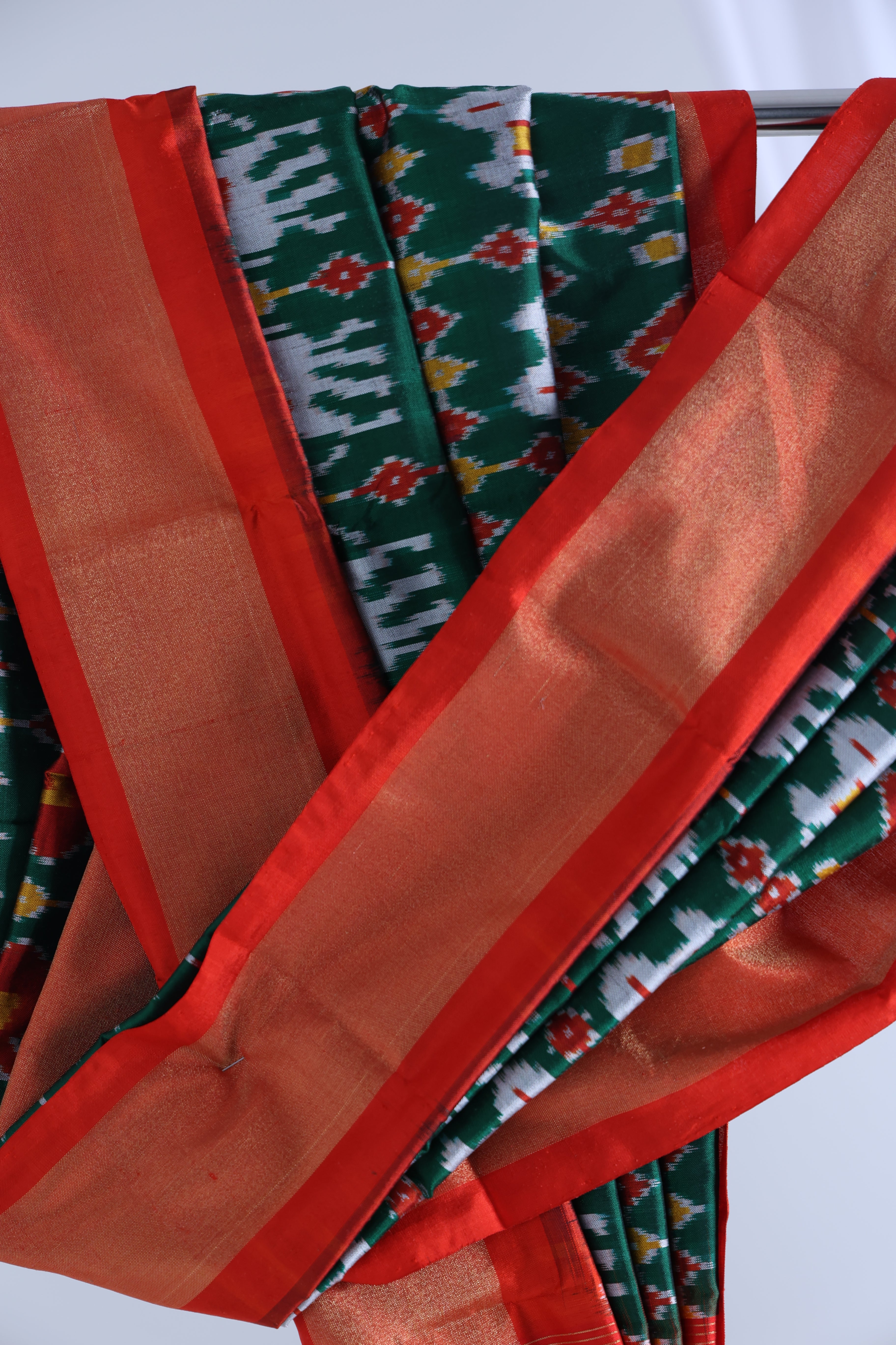 Bottle green with red colour ikkat dupatta