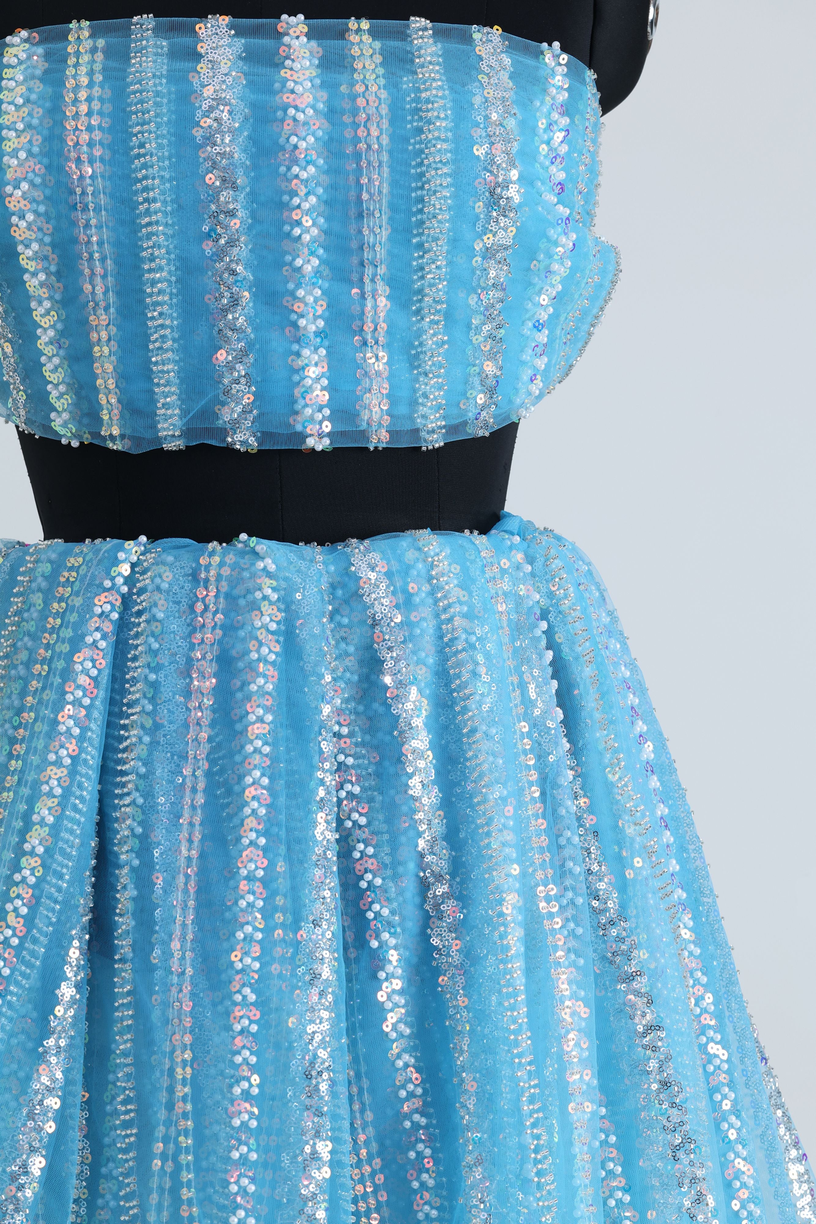 Blue net fabric with floral pattern
