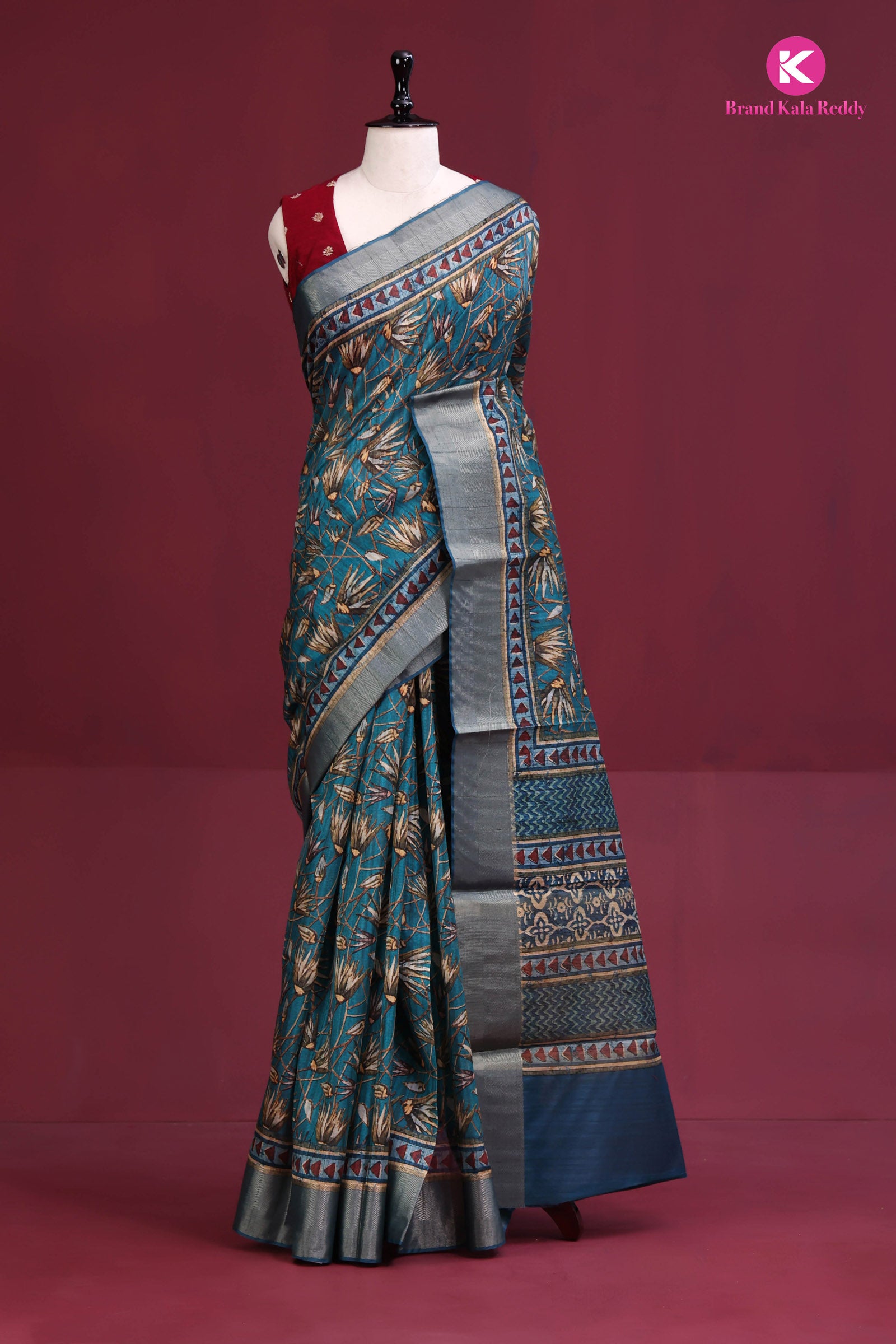 Teal Canvas: Contemporary Printed Silk Saree with Geometric Border