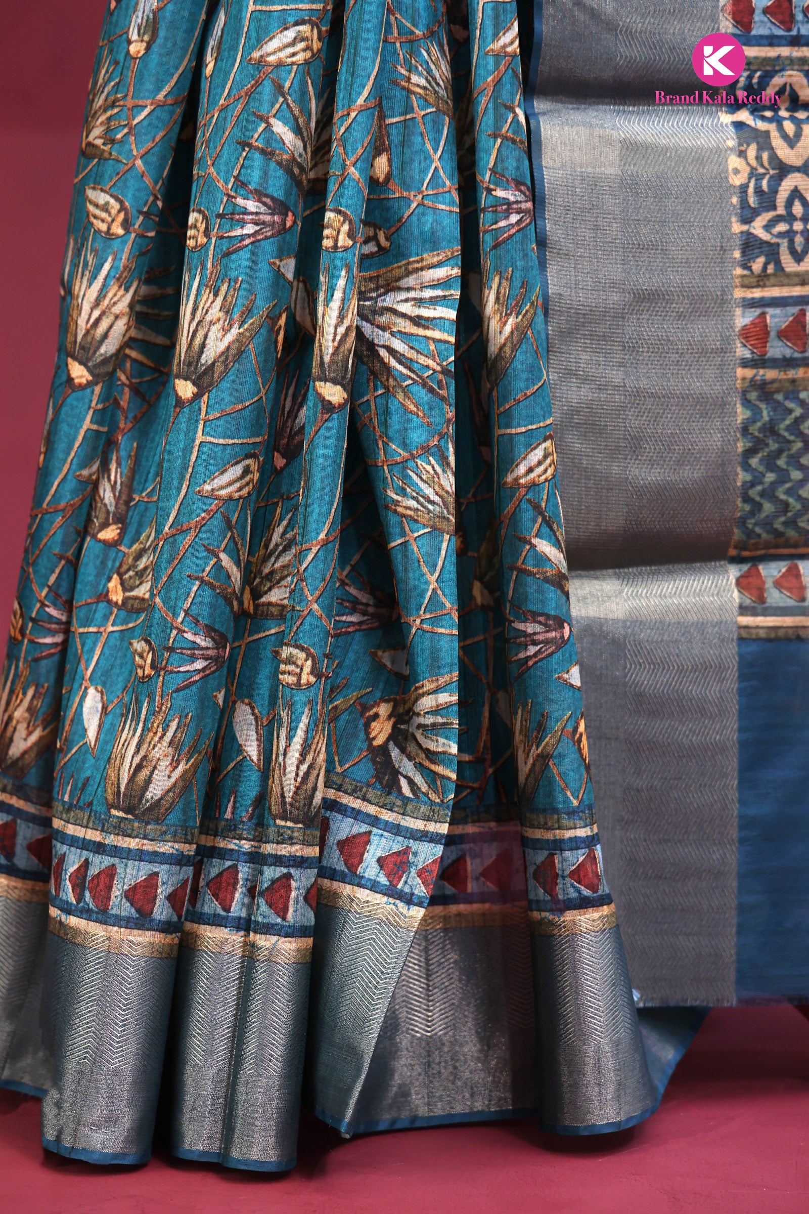 Teal Canvas: Contemporary Printed Silk Saree with Geometric Border