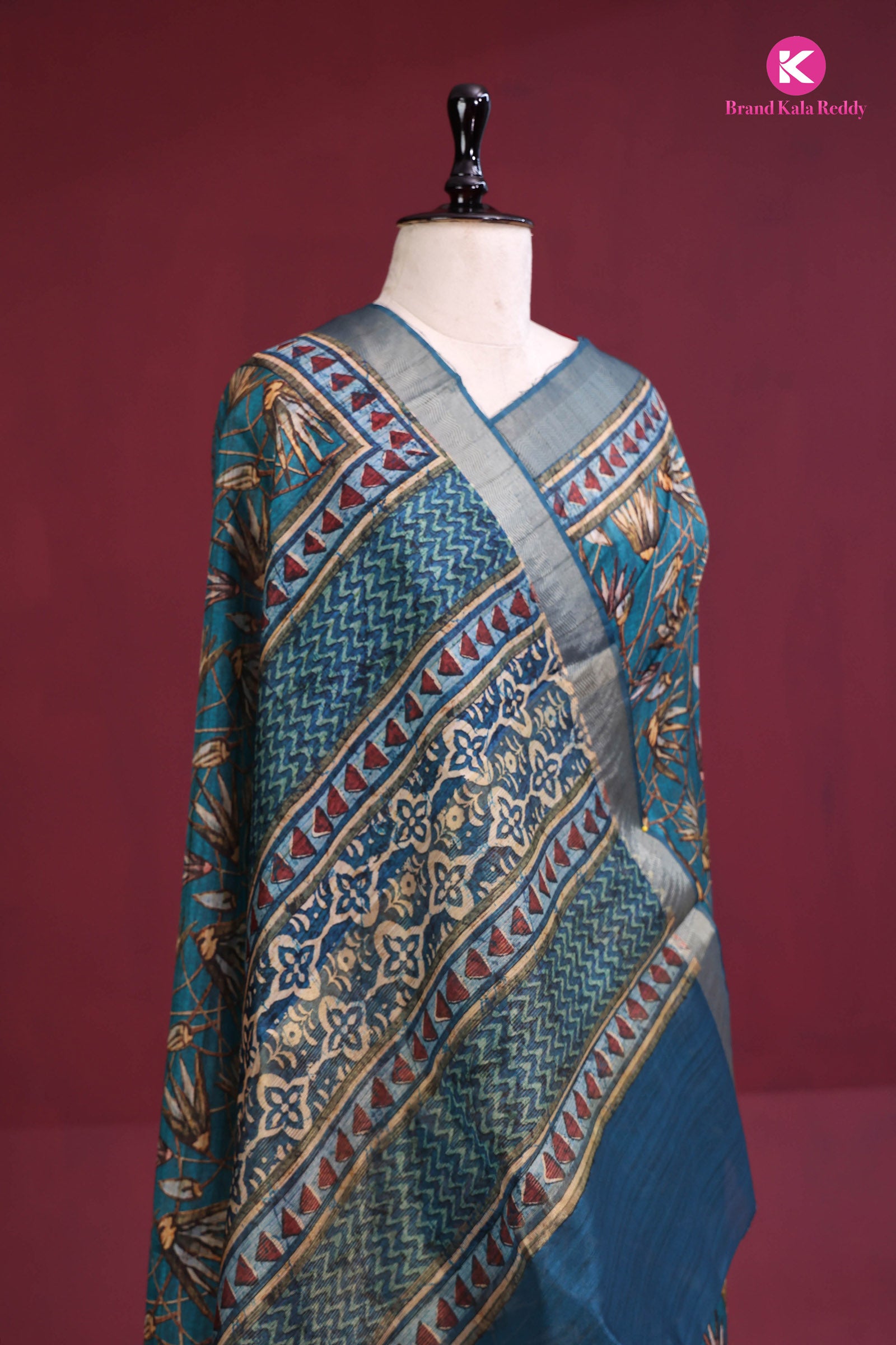 Teal Canvas: Contemporary Printed Silk Saree with Geometric Border