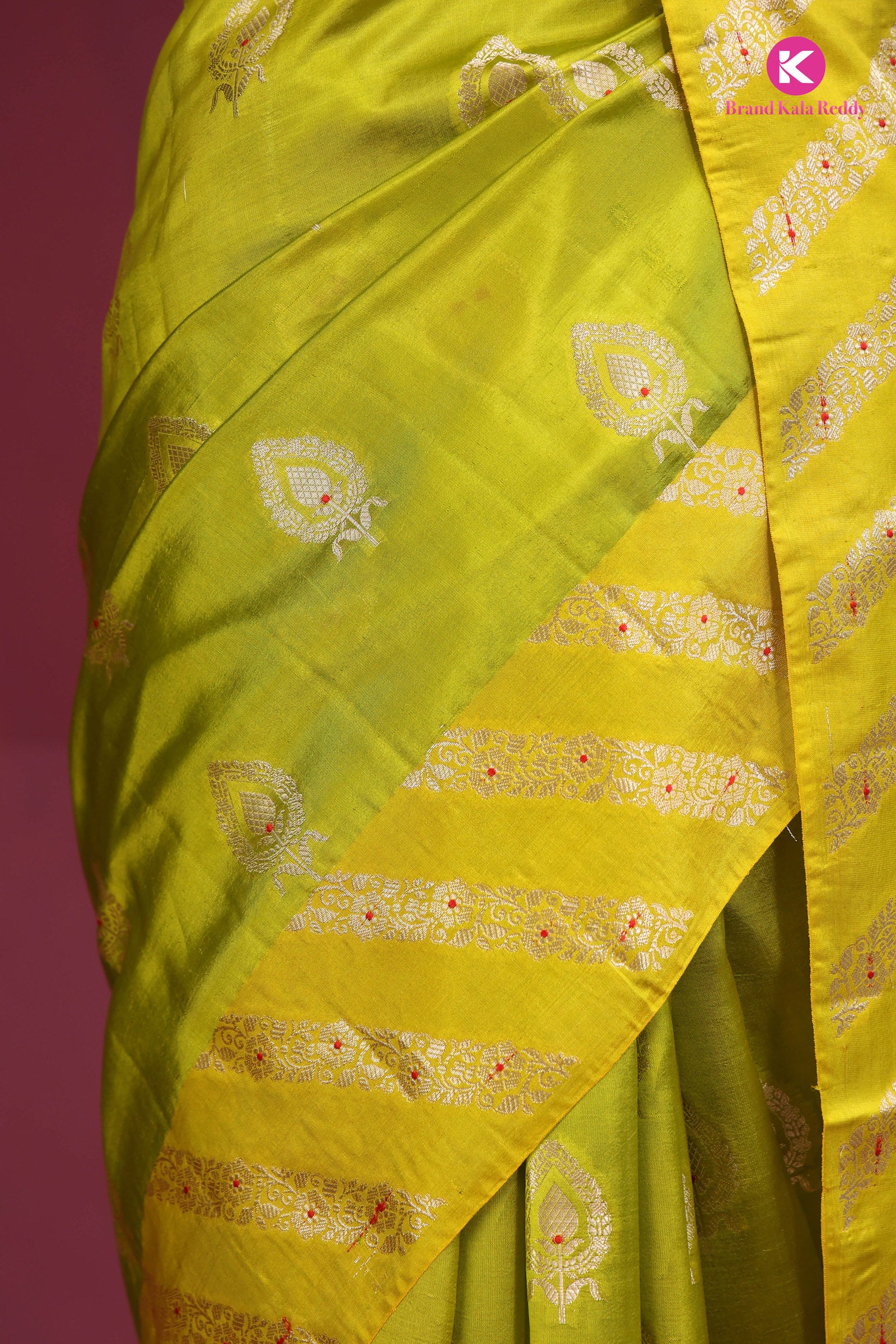 A lime green Banarasi saree
