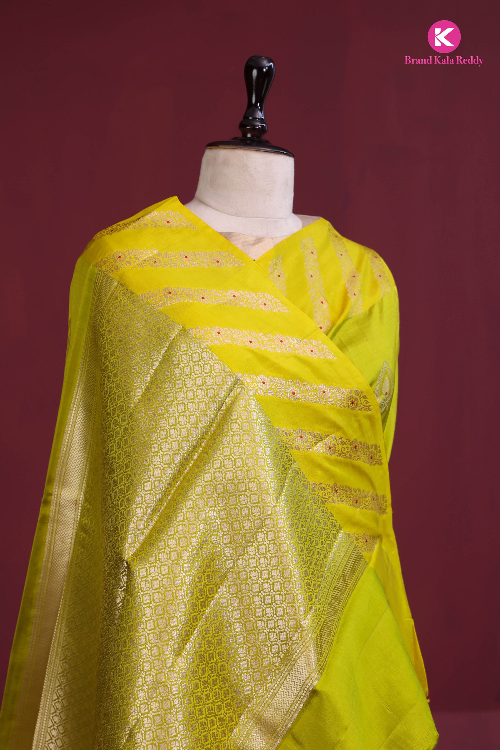 A lime green Banarasi saree