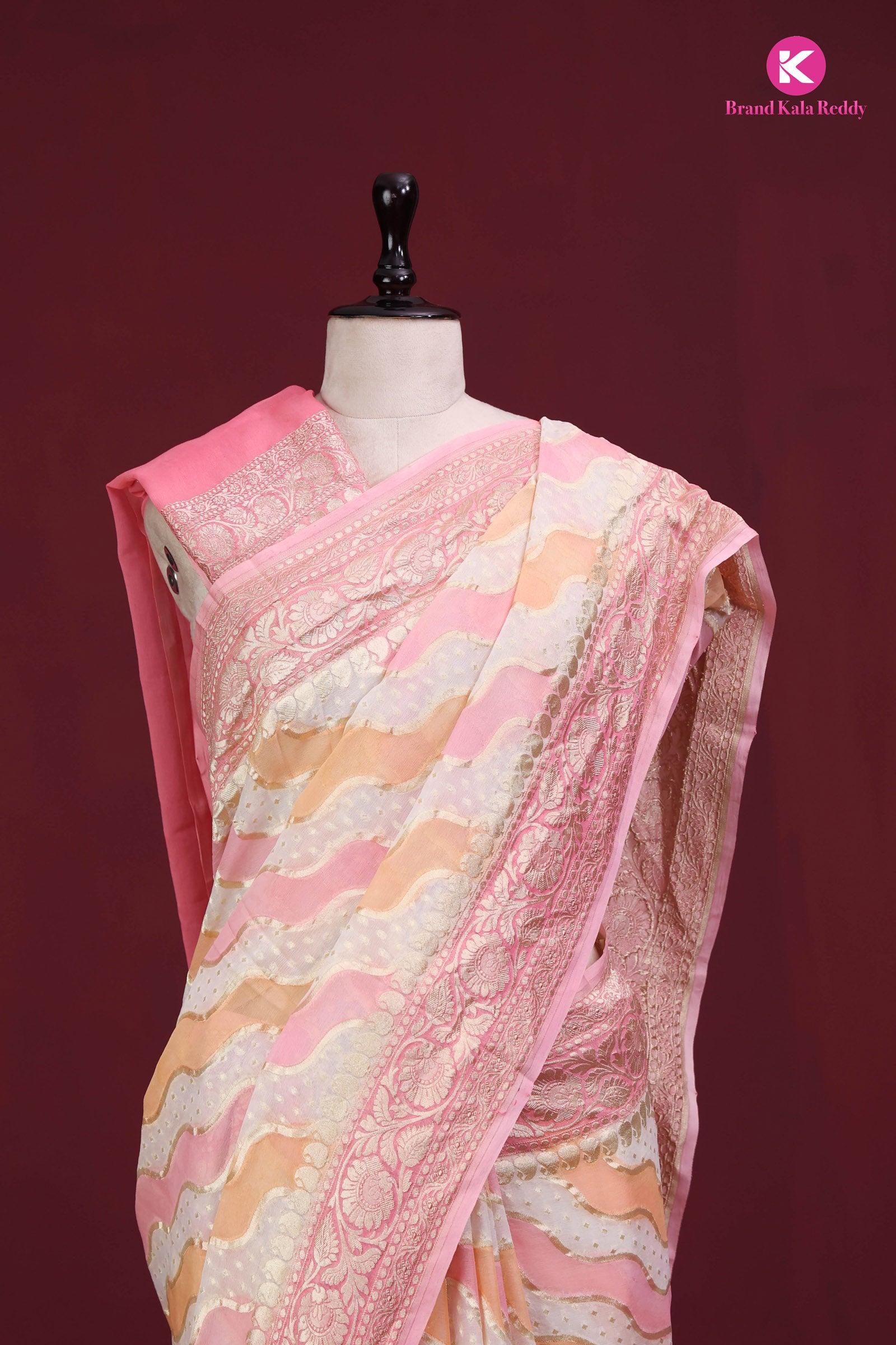 A pastel pink colour Georgette Banarasi saree in Rankat style