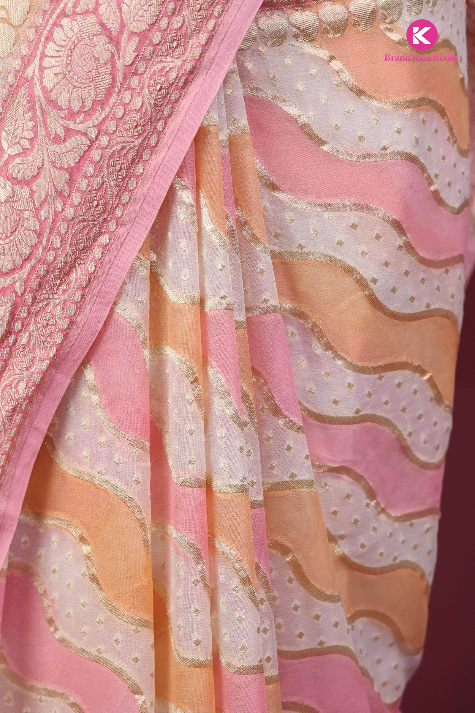 A pastel pink colour Georgette Banarasi saree in Rankat style