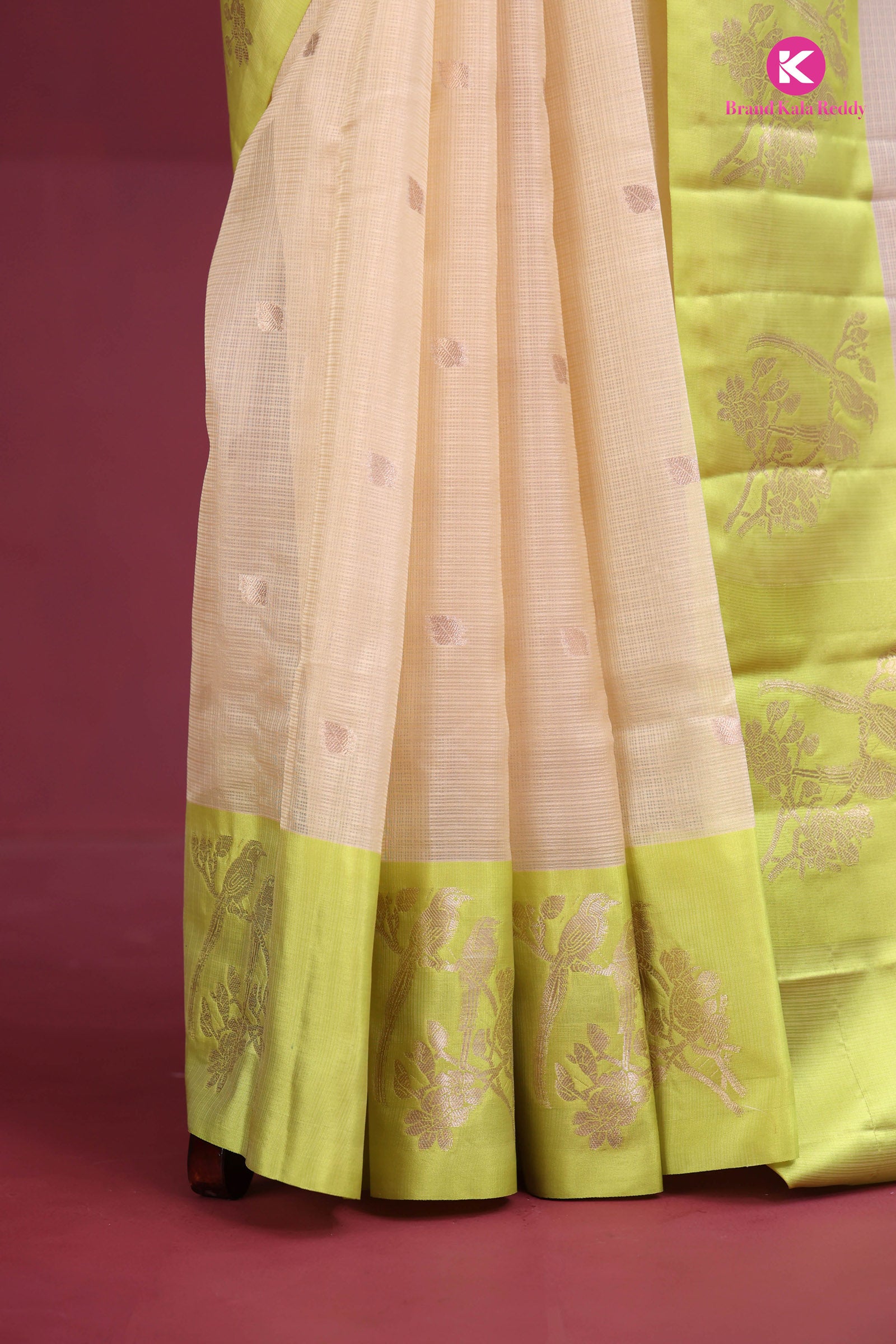 Beige zari Kota Saree with a Lime Green Border