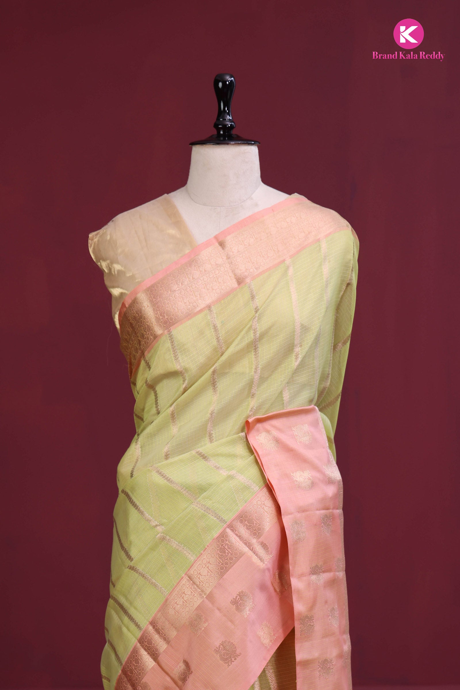 Pastel Green Zari Kota Saree with a Blush Pink Border