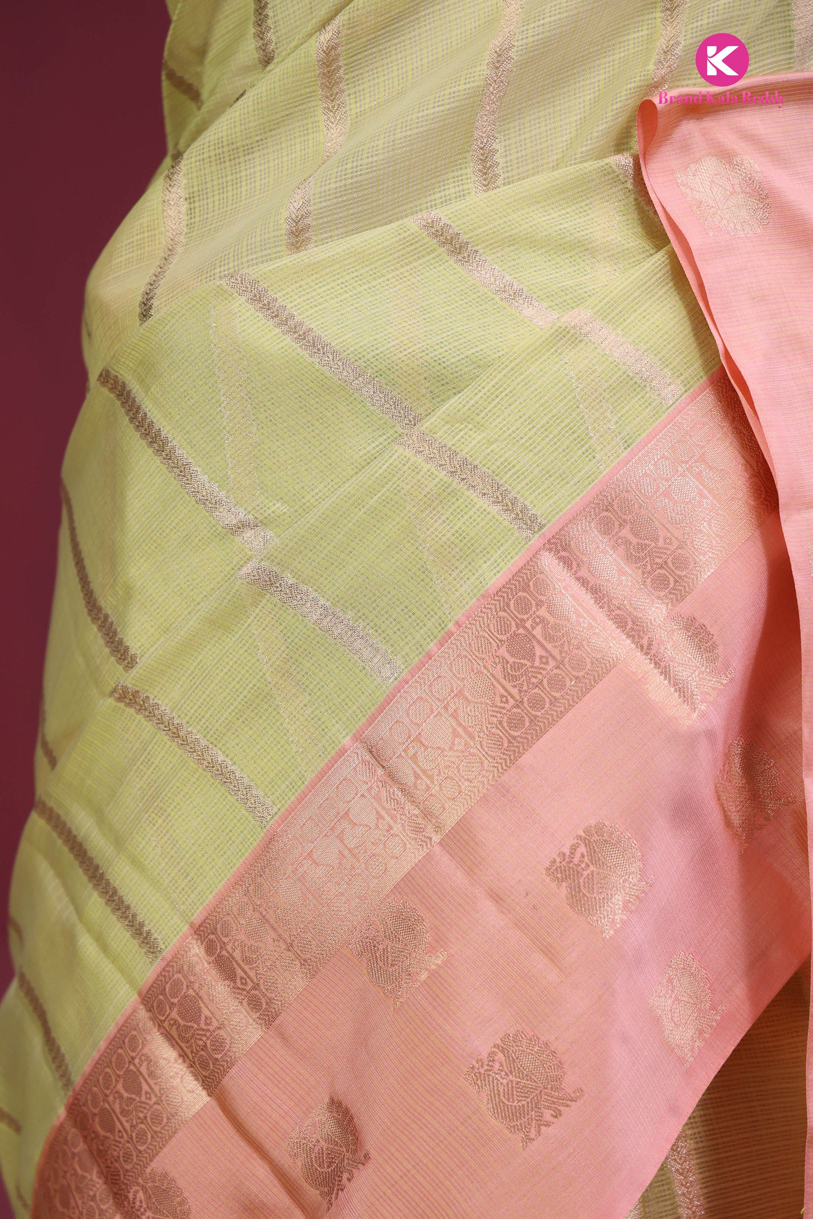 Pastel Green Zari Kota Saree with a Blush Pink Border